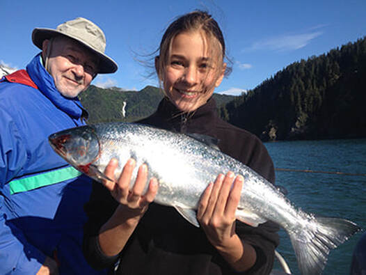 Girl Catching Silver Salmon